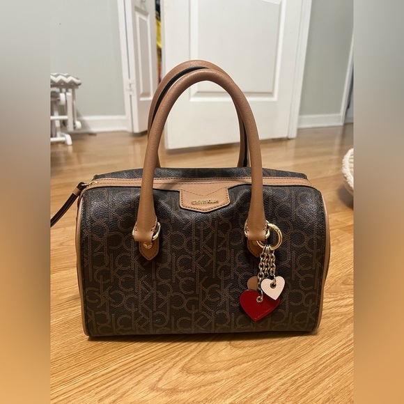 Calvin Klein Handbags - Calvin Klein Brown Monogram Satchel